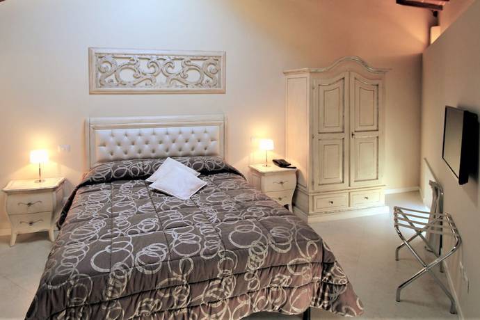 Imagen de la habitación del Boutique Villa del Sole Siena. Foto 17