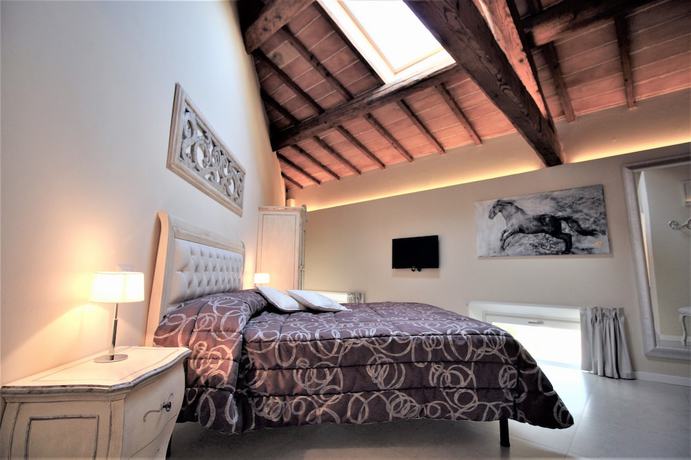 Imagen de la habitación del Boutique Villa del Sole Siena. Foto 19