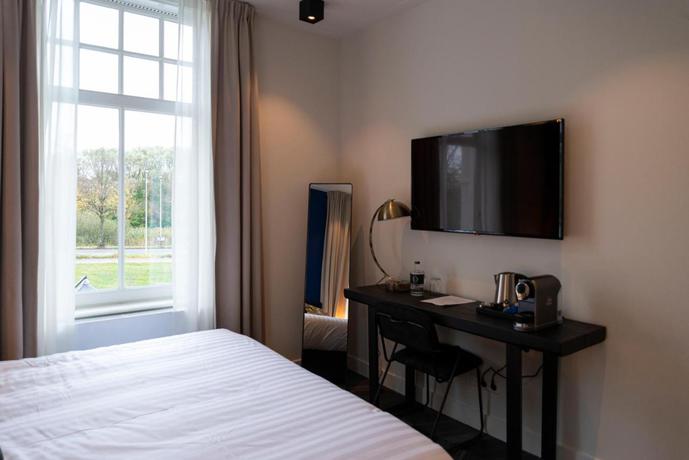 Imagen de la habitación del Boutique WesterVilla. Foto 7