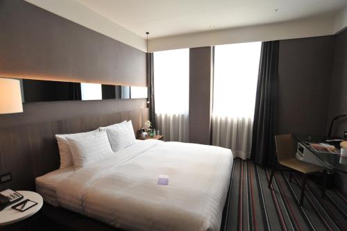 Imagen de la habitación del Boutique Westgate Hotel. Foto 7