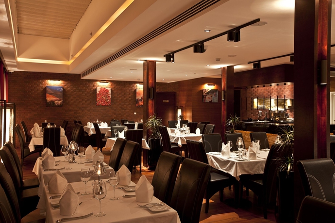 Imagen del bar/restaurante del Boutique Zubarah Hotel. Foto 3