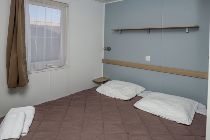 Imagen de la habitación del Camping Bungalows Caravaning. Foto 5