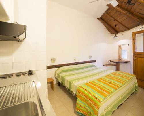 Imagen de la habitación del Camping Cugnana Porto Rotondo Bungalows -. Foto 3