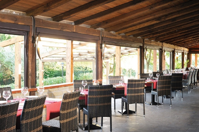 Imagen del bar/restaurante del Camping Happy Village and. Foto 2