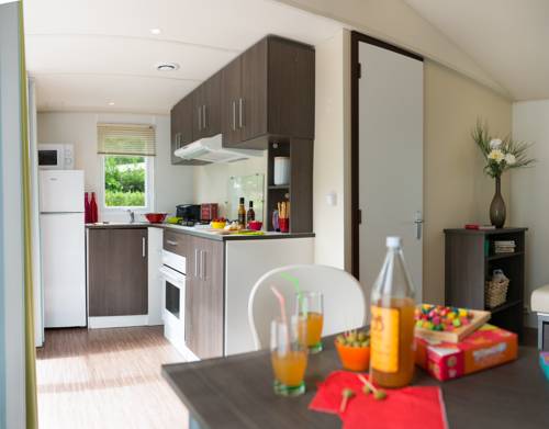 Imagen de la habitación del Camping Officiel Siblu Les Pierres Couchées. Foto 10