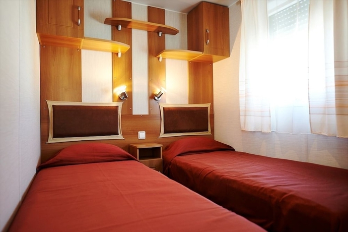 Imagen de la habitación del Camping Parque De Campismo Orbitur Montargil. Foto 9