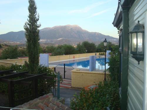 Imagen de la habitación del Camping Rural Presa La Vinuela. Foto 14