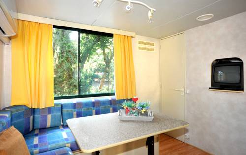 Imagen de la habitación del Camping Village Baia Azzurra Club. Foto 7