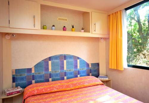 Imagen de la habitación del Camping Village Baia Azzurra Club. Foto 8