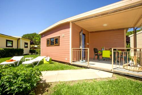Imagen de la habitación del Camping Village Baia Azzurra Club. Foto 13