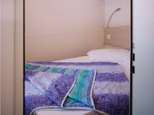 Imagen de la habitación del Camping Village Baia Blu La Tortuga. Foto 6