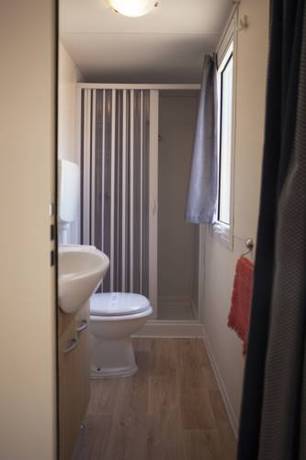 Imagen de la habitación del Camping Village Baia Blu La Tortuga. Foto 7