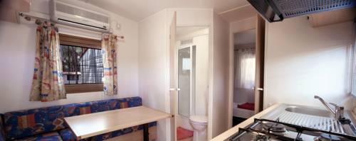 Imagen de la habitación del Camping Village Baia Blu La Tortuga. Foto 9