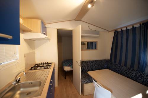 Imagen de la habitación del Camping Village Baia Blu La Tortuga. Foto 10