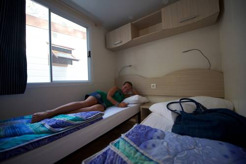 Imagen de la habitación del Camping Village Baia Blu La Tortuga. Foto 15