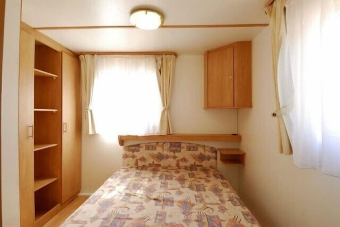 Imagen de la habitación del Camping Village Capo D'orso. Foto 2