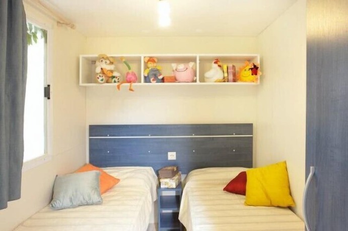 Imagen de la habitación del Camping Village Capo D'orso. Foto 7