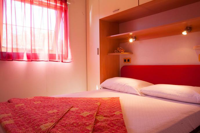 Imagen de la habitación del Camping Village Capo D'orso. Foto 16