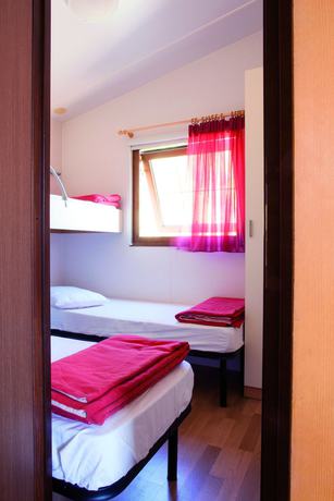 Imagen de la habitación del Camping Village Capo D'orso. Foto 17