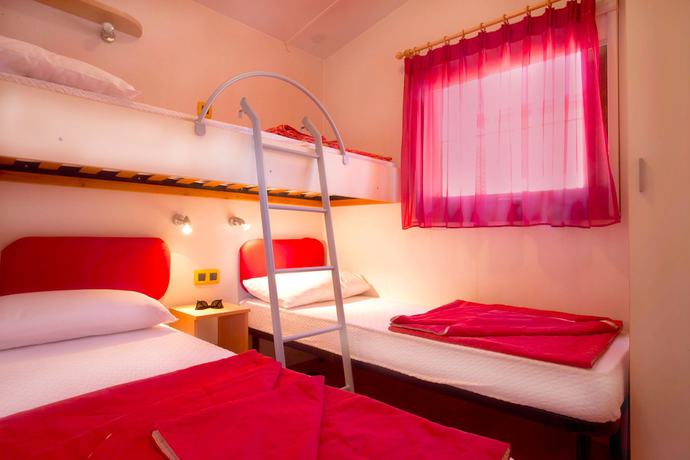 Imagen de la habitación del Camping Village Capo D'orso. Foto 18