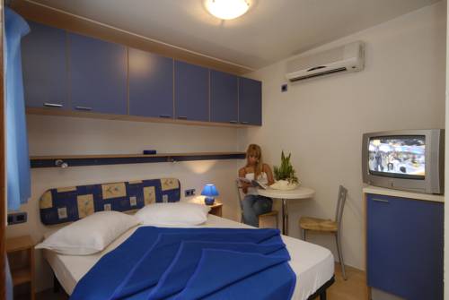 Imagen de la habitación del Camping Village Cavallino. Foto 12