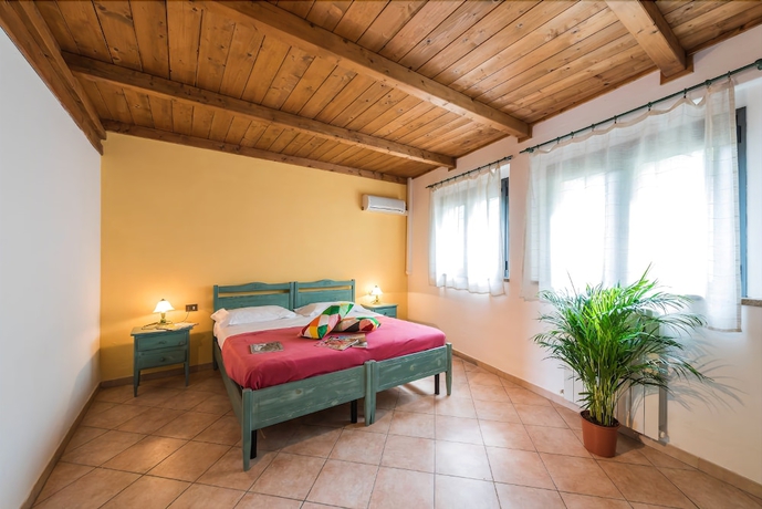 Imagen de la habitación del Camping Village Il Poggetto. Foto 13