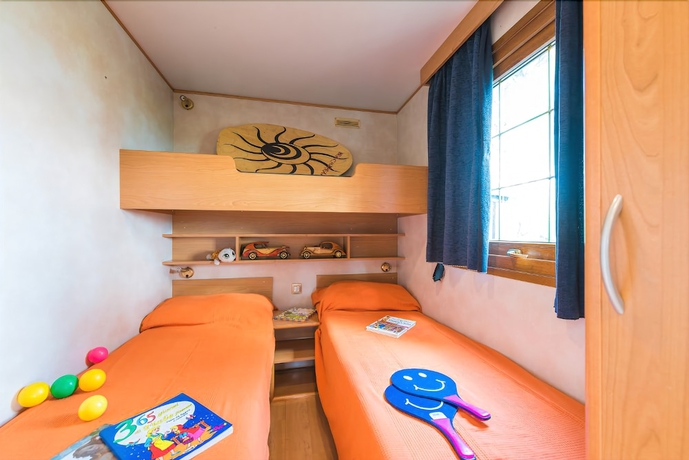 Imagen de la habitación del Camping Village Il Poggetto. Foto 15