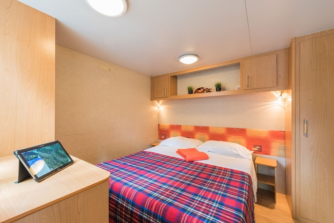 Imagen de la habitación del Camping Village Il Poggetto. Foto 16