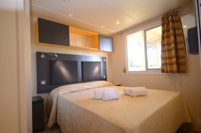 Imagen de la habitación del Camping Village Parco Della Gallinara. Foto 2