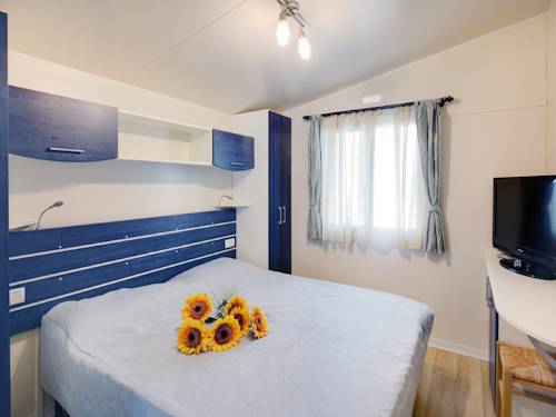 Imagen de la habitación del Camping Village Pino Mare. Foto 6