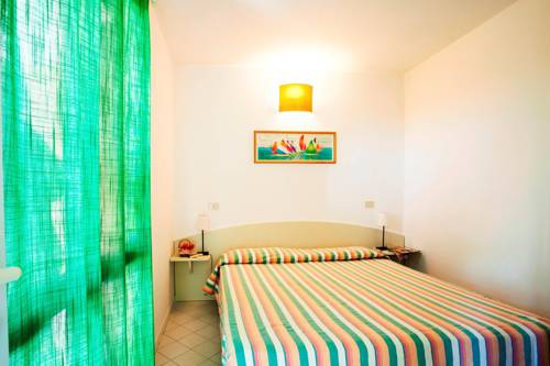 Imagen de la habitación del Camping Village Rosselba Le Palme. Foto 11