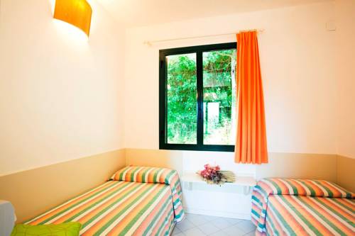 Imagen de la habitación del Camping Village Rosselba Le Palme. Foto 13