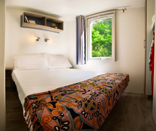 Imagen de la habitación del Camping hu Altomincio Village. Foto 4