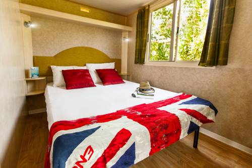 Imagen de la habitación del Camping hu Altomincio Village. Foto 7