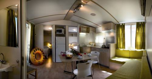 Imagen de la habitación del Camping hu Altomincio Village. Foto 10