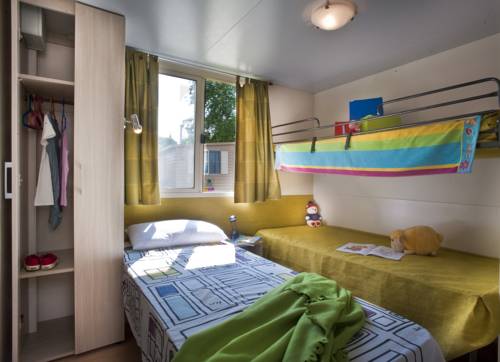 Imagen de la habitación del Camping hu Altomincio Village. Foto 12