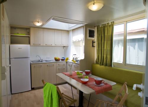 Imagen de la habitación del Camping hu Altomincio Village. Foto 13