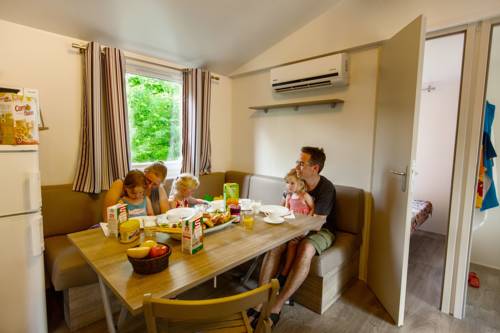 Imagen de la habitación del Camping hu Altomincio Village. Foto 16