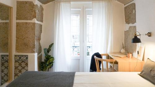 Imagen de la habitación del Casa de Huéspedes 262 Baixa Guesthouse. Foto 11