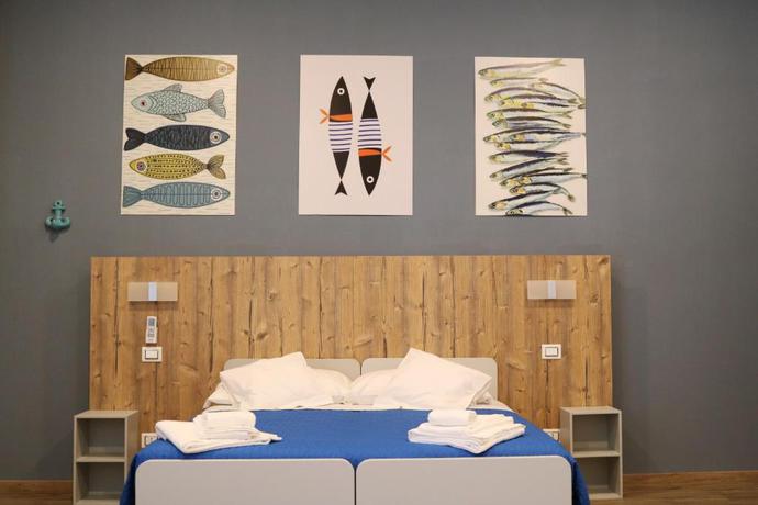 Imagen de la habitación del Casa de Huéspedes Affittacamere I Sapori Del Levante. Foto 5