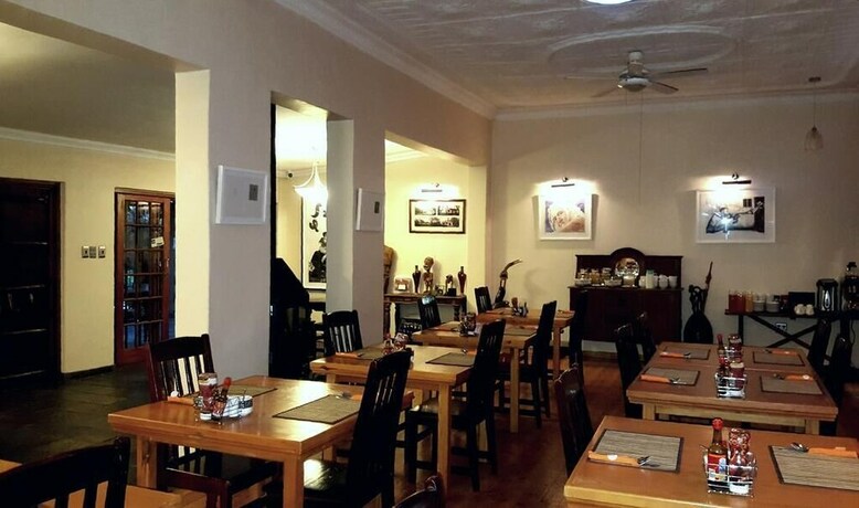 Imagen del bar/restaurante del Casa de Huéspedes African Roots Guest House. Foto 14