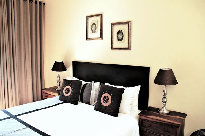 Imagen de la habitación del Casa de Huéspedes African Roots Guest House. Foto 16