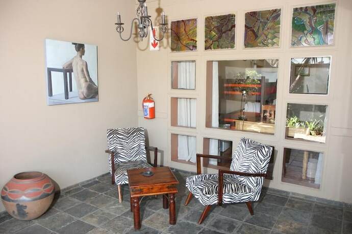 Imagen de la habitación del Casa de Huéspedes African Roots Guest House. Foto 19