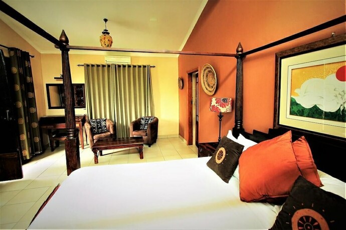 Imagen de la habitación del Casa de Huéspedes African Roots Guest House. Foto 29