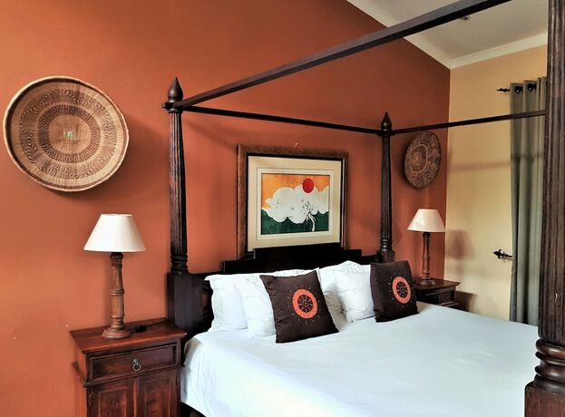 Imagen de la habitación del Casa de Huéspedes African Roots Guest House. Foto 31