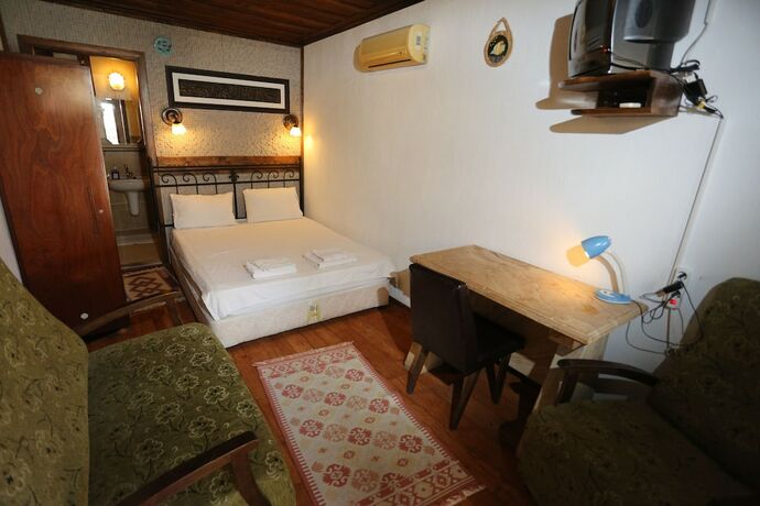 Imagen de la habitación del Casa de Huéspedes Akropolis Guest House. Foto 32