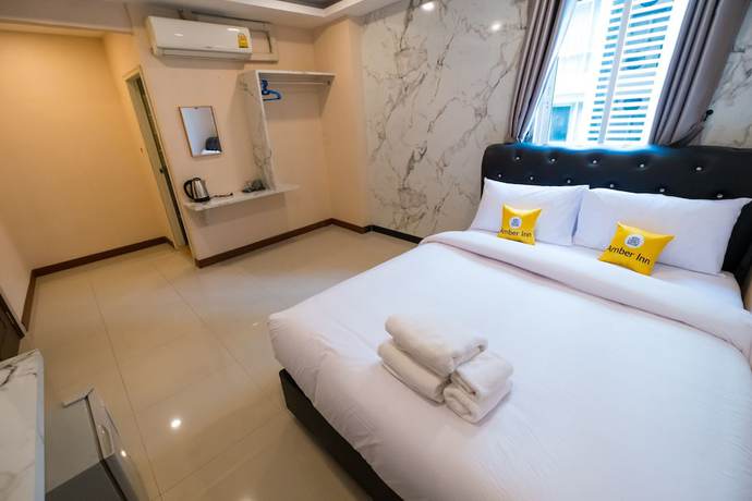 Imagen de la habitación del Casa de Huéspedes Amber Inn, Bangkok. Foto 6