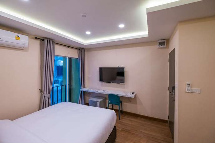 Imagen de la habitación del Casa de Huéspedes Amber Inn, Bangkok. Foto 9
