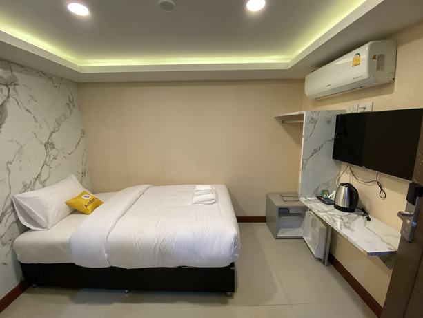 Imagen de la habitación del Casa de Huéspedes Amber Inn, Bangkok. Foto 11