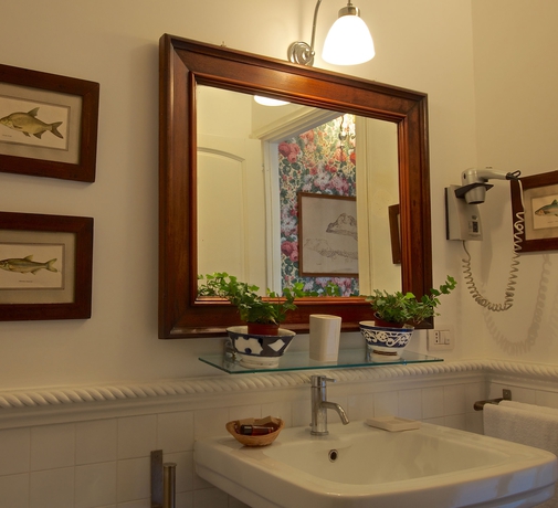 Imagen de la habitación del Casa de Huéspedes Arco Dei Tolomei. Foto 8